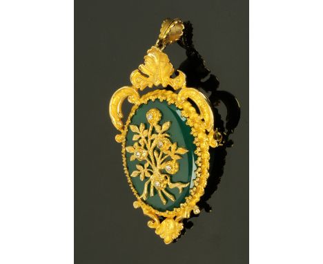 A 9 ct gold jade and diamond set pendant, 18.4 grams, 58 mm x 35 mm (see illustration).