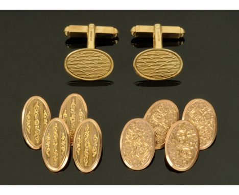 Three pairs of 9 ct gold cufflinks, each of oval form and with engraved foliate decoration or engine turned decoration, 16.9 