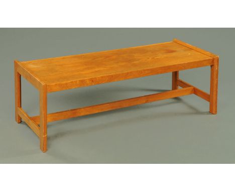 A Gordon Russell teak coffee table, rectangular and bearing Gordon Russell Ltd., Broadway, label beneath.  12 cm x 50.5 cm.  