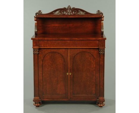 A William IV plum pudding mahogany chiffonier, with rear shelf and upstand with scroll supports, with frieze drawer and pair 