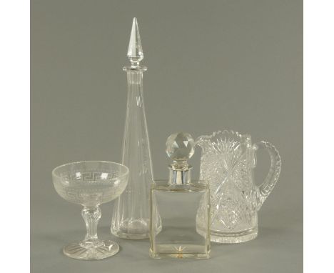 An Irish hobnail cut glass jug, sweetmeat dish, silver mounted decanter and decanter.  