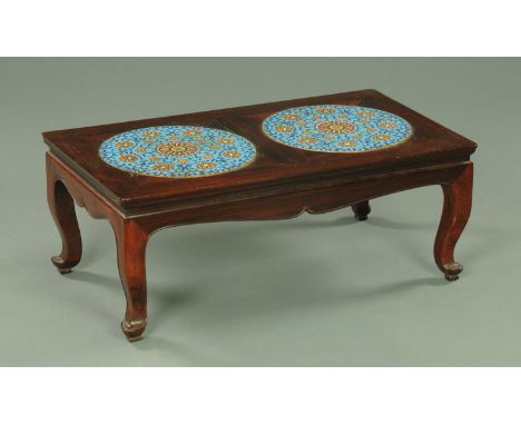 A Chinese hardwood coffee table, the top inset with blue foliate cloisonné plaques.  83 cm x 46 cm x 33 cm (see illustration)