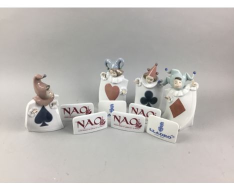 FOUR NAO FIGURES, modelled as playing cards, along with a set of Nao ceramic labels