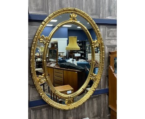 GILT FRAMED OVAL WALL MIRROR, 71cm x 92cm