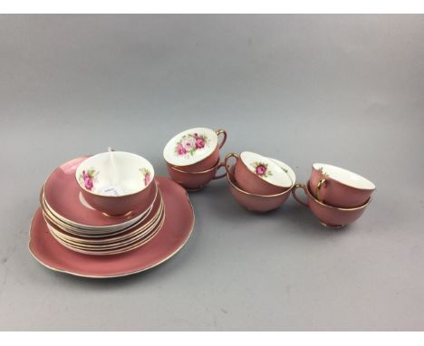 MID 20TH CENTURY ENGLISH BONE CHINA TEA SERVICE, decorated with roses, comprising six cups, saucers and side plates, biscuit 