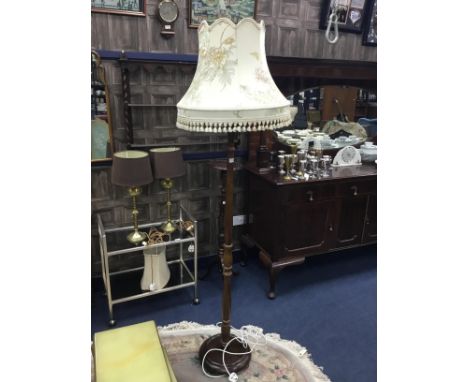 MAHOGANY STANDARD LAMP, with a floral and fringed shade, 160cm high