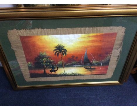 TWO PAINTINGS ON PAPYRUS, depicting pyramids, framed and under glass, 58cm x 78cm, along with other pictures including a pain