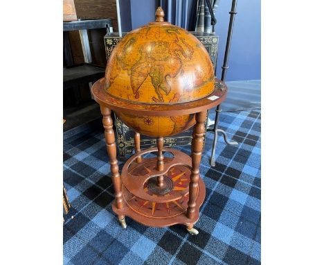 TERRESTRIAL GLOBE BAR, with hinged cover opening to reveal a fitted interior, 93cm high