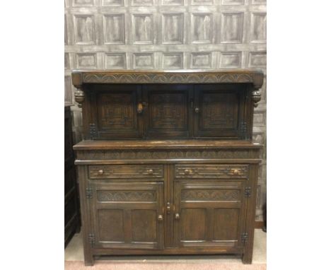 OAK BUFFET CUPBOARD OF 17TH CENTURY DESIGN, the overhanging cornice with arcaded frieze and turned bulbous pendants, over thr