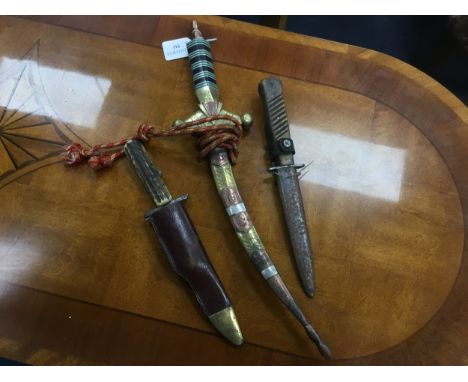 PERSIAN DAGGER, along with two other daggers (3)