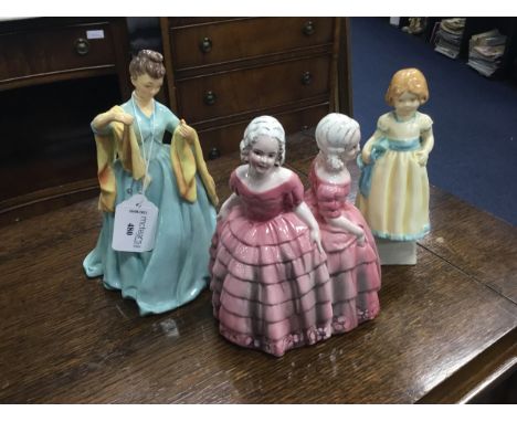 PAIR OF CERAMIC FIGURAL BOOKENDS, along with two other ceramic figures and two dishes