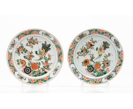 A pair of platesChinese export porcelain Polychrome "Famille Verte" enamelled decoration with central flowering bushes and pe