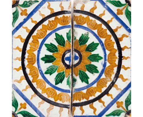 Two Hispanic-Moorish tilesIn glazed ceramic With Mudejar decoration representing flowers  (minor losses and faults)24x12 cm (
