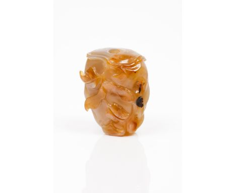 Snuff bottleCarved jade Shaped as a fruit Qing Dynasty (1644–1912) (missing the stopper)Height: 6 cm
