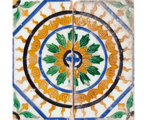 Two Hispanic-Moorish tilesIn glazed ceramic With Mudejar decoration representing flowers  (minor losses and faults)24x12 cm (