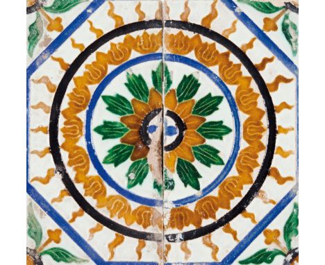 Two Hispanic-Moorish tilesIn glazed ceramic With Mudejar decoration representing flowers  (minor losses and faults)24x12 cm (