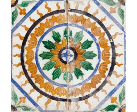 Two Hispanic-MoorishIn glazed ceramic With Mudejar decoration representing flowers  (minor losses and faults)24x12 cm (each t