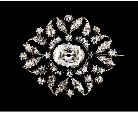 A broochSilver and gold, 19th century Romantic period decoration set with small antique cut diamonds the central (ca. 1.10ct)