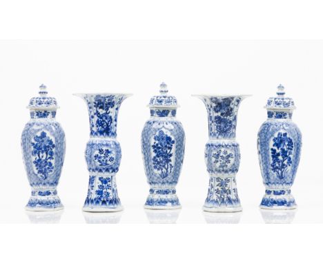 A garnitureChinese porcelain Blue underglaze decoration with floral motifs, geometric patterns and lotus petals Three pots wi