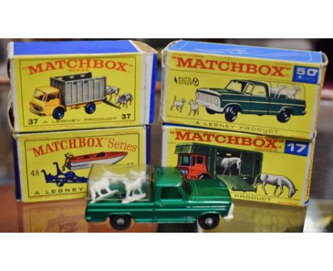 Matchbox - a Horse Box (AEC), 17E, Stannard Code - 3, red body, blue tinted windows, 2 white plastic horses, boxed; a Cattle 