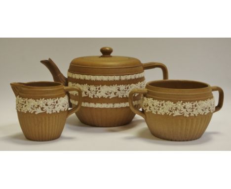 A Royal Doulton Lambeth Silcon Ware tea set, comprising teapot, sugar bowl and milk jug, impressed marks 