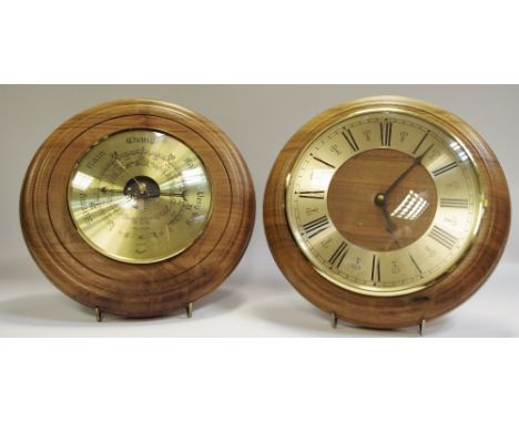 A Mike Hine Elmwood mounted wall clock; a Mike Hine Elmwood rounded wall barometer (2)