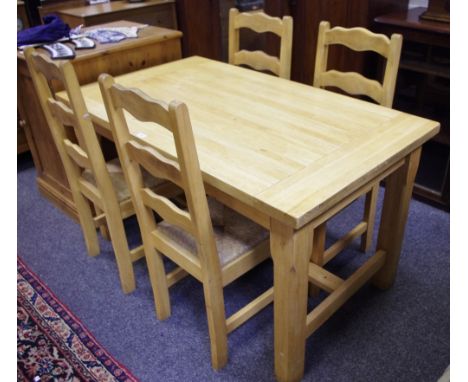 A modern oak plank top kitchen dining table, four ladder back chairs, rush seats, (5)