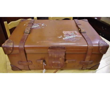 A substantial leather bound trunk, linen interior removable tray