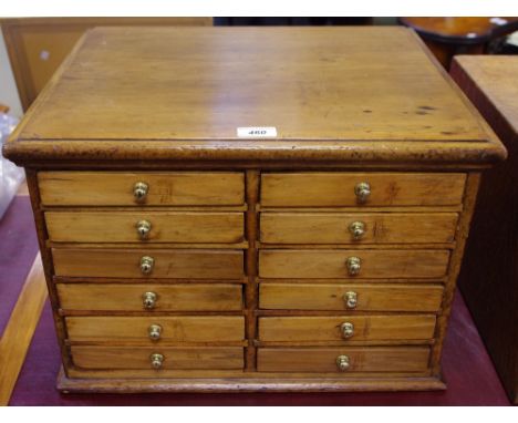 A 12 drawer bobbin chest, two flights of six drawers, brass button handles, 34cm high x 48.5cm wide x 40.5cm deep, c.1900