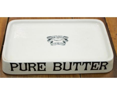 An early 20th century shop display Pure Butter ceramic stand, Reuben Sutcliffe, Manchester, 40cm wide