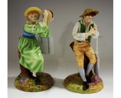 A pair of Royal Worcester musician figures, Strephon and Phyllis, modelled by James Hadley