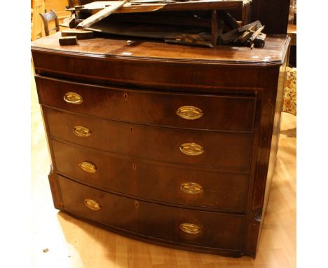 A George III mahogany bow front four drawer chest.