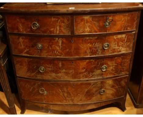 A Victorian mahogany bow-front chest, slightly oversailing top above two short and three long graduated cockbeaded drawers, o