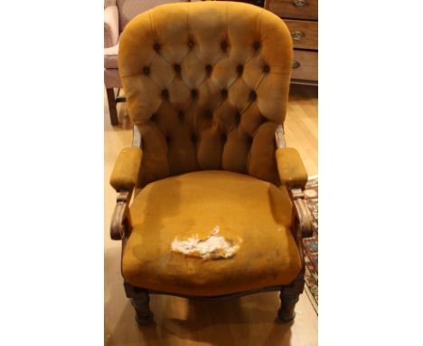 A Victorian mahogany framed open armchair, deep button back, scroll handrests, 98cm high *** Please note this lot may be damp