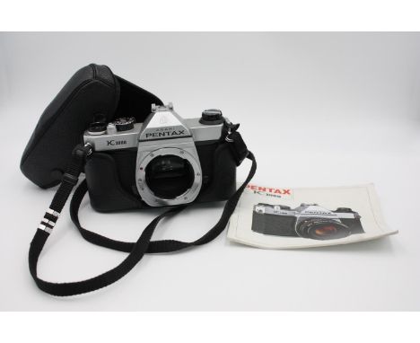Pentax K1000 SLR Film Camera Body Only w/ Case &amp; Instructions  The camera is WORKING and in a good condition Winds and fi