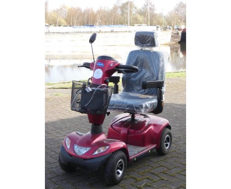 An Invacare Orion four wheeler mobility scooter complete with, battery charger