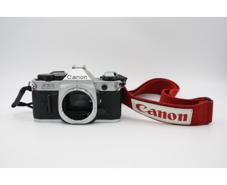 Canon AE-1 Program 35mm SLR Film Camera Body Only w/ Retro Canon Strap  Signs of forming CANON COUGH - should be serviced  Th