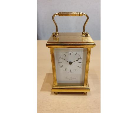 A collection of mantle clocks and barometers to include a Thomas Braithwaite brass quartz carriage clock (2)