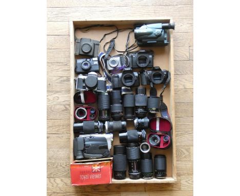 A collection of cameras including a Bell and Howell Microstar z, a Canon EOS 1000Fn and a Kodak Browie 8mm Movie Camera 2 alo