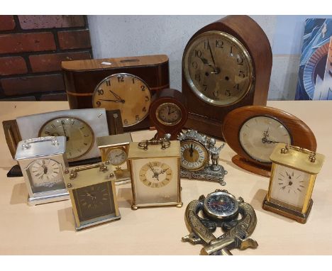 An Edwardian oak cased lancet mantle clock, an art deco mantle clock with two florins weekly savings clock and other mantle a