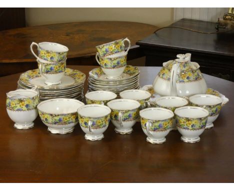 A Royal Albert 'Mary's Garden' tea set consisting of- twelve tea cups, twelve saucers, twelve side plates, serving dish, teap