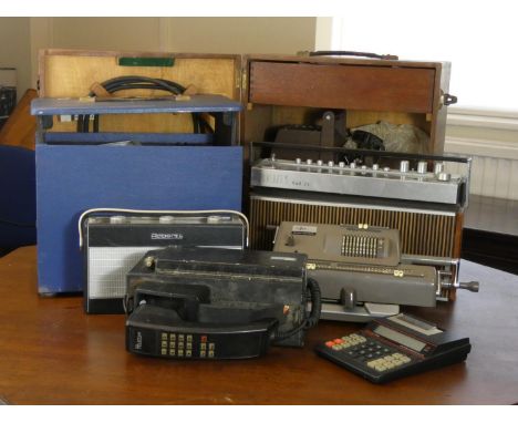 A Fidelity transistor radio, a Roberts transistor radio, boxed Nippon calculators, an early BT telephone, projectors, camera 