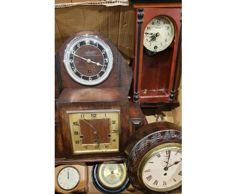 An Edwardian oak case 8 day bulkhead clock, a Smith brass electric lantern clock and other clocks (2).