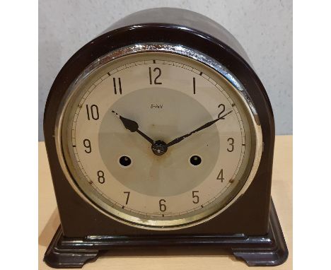 A collection of mantle and carriage clocks including an Enfield Bakelite mantle clock