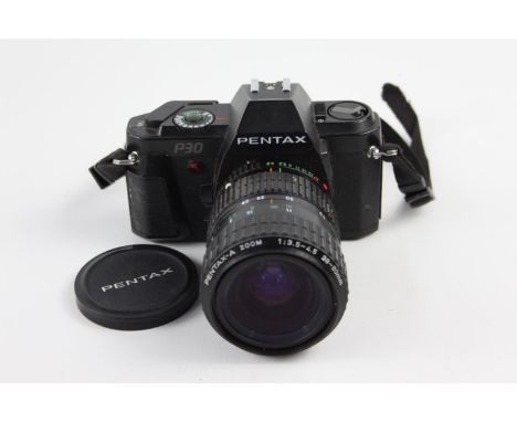 Pentax P30 SLR Film Camera w/ Pentax-A 28-80mm F/3.5-4.5 Lens  The camera is WORKING and in a vintage condition Winds and fir