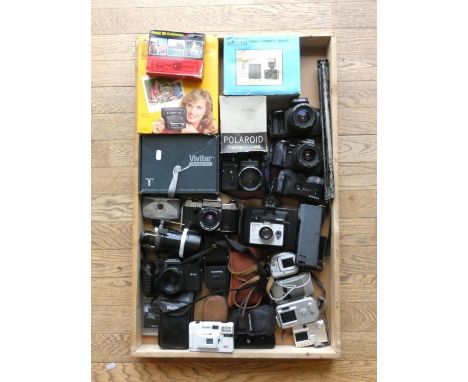 A collection of cameras including a Praktica Tova, Meikai AR-4367 and Kodak Instamatic 104 along with others 