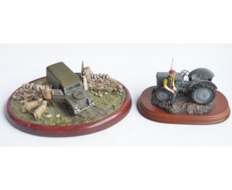 Two well presented farming related dioramas to include resin/ceramic grey tractor with resting driver figure (scale approx 1/