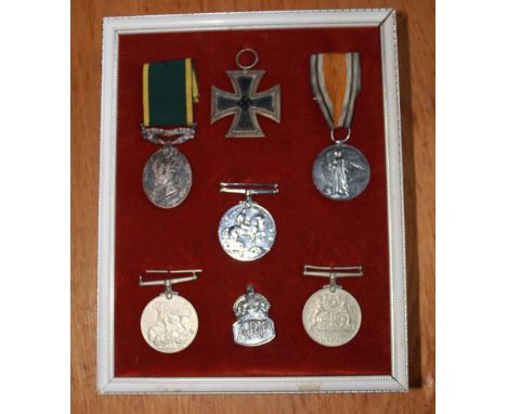 Framed collection of Medals. Victory Medal, 1914-18 War Medal, Territorial Army For Efficient Service. To 23330 Pte L. Chadwi