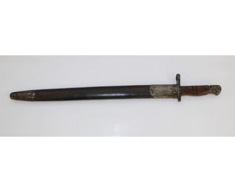 1911 US Army Bayonet complete with original leather scabbard. 