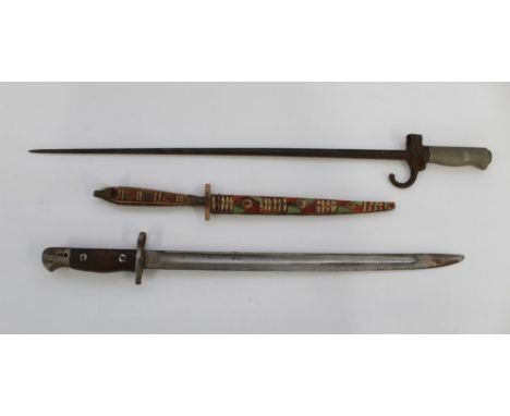 Lee-Enfield 1907 pattern bayonet. French model 1886 Lebel Bayonet. Tribal knife with wooden handle and scabbard. 